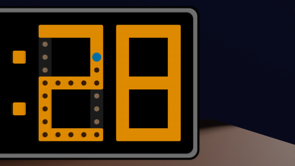 Screenshot from the game: orange digits with some dots in one of them.