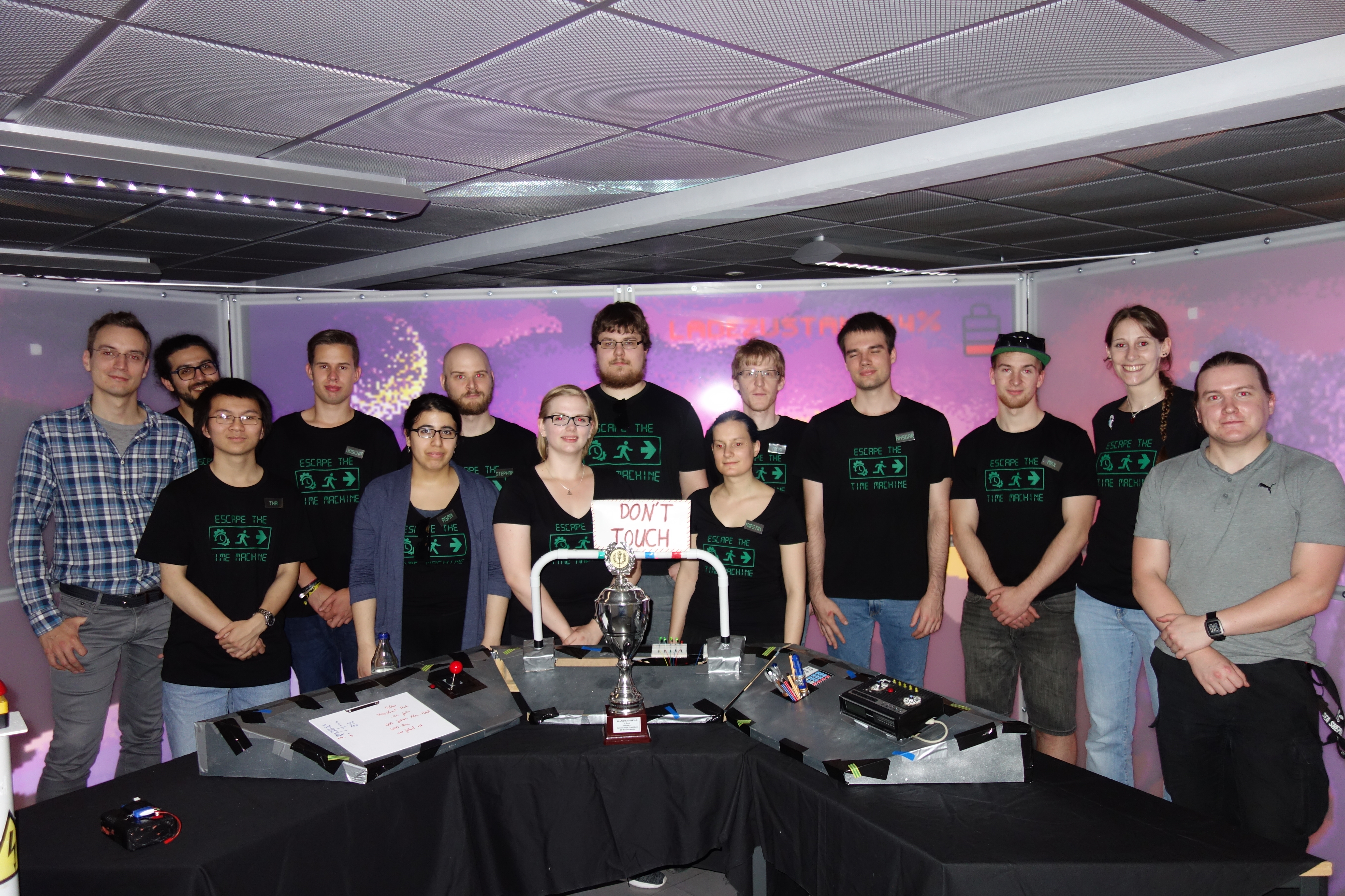 photo of the escape room project team with the award