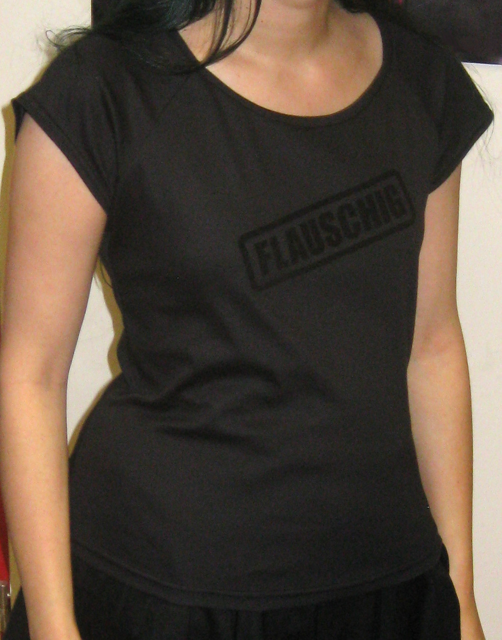 A photo of my t-shirt with the "flauschig" stamp motive